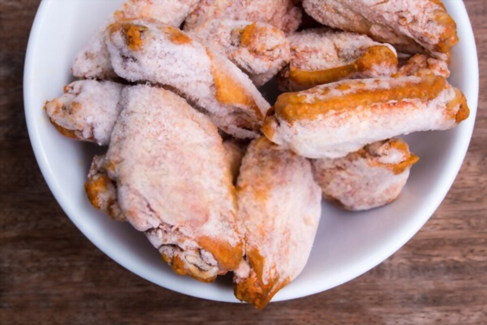 How long to deep fry frozen chicken wings?